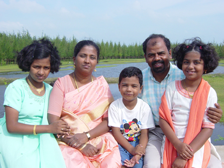 Kareebiran with his family members including the three children he lost to tsunami 2004.